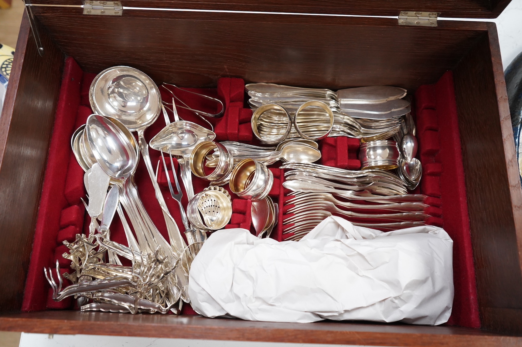 An oak cased, near complete, comprehensive canteen of plated cutlery together with odd cutlery from other sets.